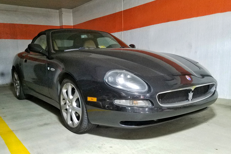 Illustration for article titled Two convertibles in what could very well be my new office garage in DC